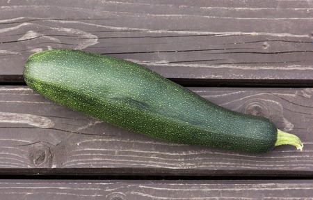 Fresh squash lie on a wooden surface, close-upの写真素材