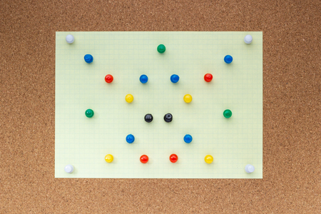 Many colored buttons on a cork boardの写真素材