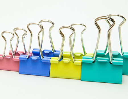 Close-up. Clip for paper of different colors, office supplies