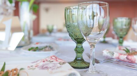 Close-up picture of empty glasses in restaurant. Selective focus.