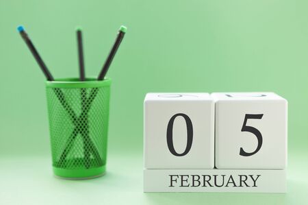 Desk calendar of two cubes for February 5の写真素材