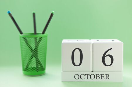 Desk calendar of two cubes for October 6の写真素材