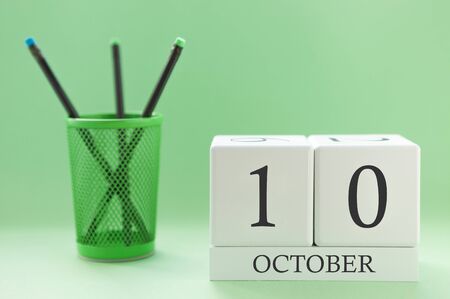 Desk calendar of two cubes for October 10の写真素材