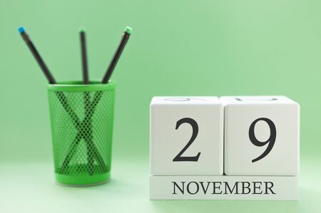 Desk calendar of two cubes for November 29の写真素材