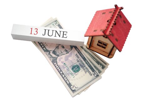 Money, home and calendar. The concept of financial independence and the scheduled start date for June 13の写真素材