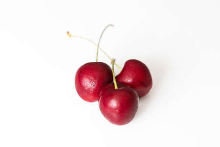 Ripe cherry on a white background, close-up. Healthy and tasty food.の写真素材