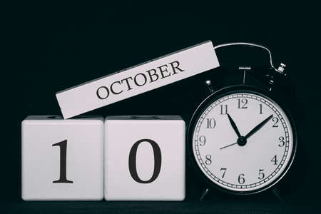 Important date and event on a black and white calendar. Cube date and month, day 10 October. Autumn season.の写真素材
