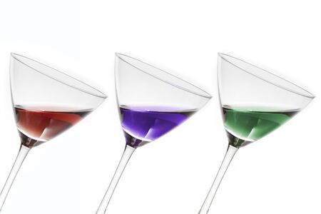 Three cocktails in different colorsの写真素材