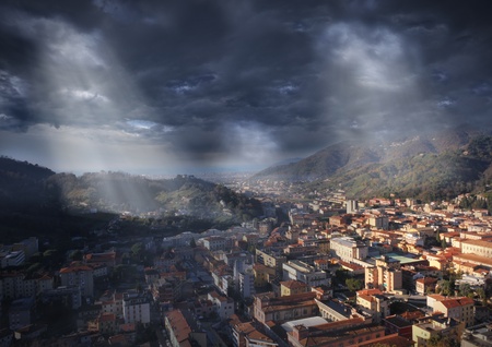 mediterran city landscape with cloudy dark skyの写真素材