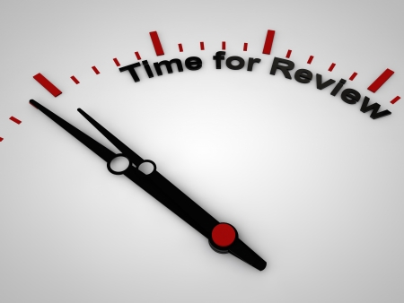 Time for review on a clock, one minute before twelveの写真素材