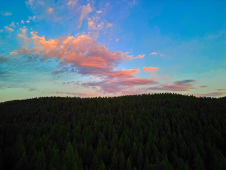 Clouds reflecting the setting sun in Flathead National Forest.の写真素材