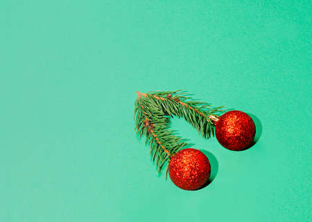 Christmas tree decoration in form of cherry and branches of conifer. The decoration is made of real...