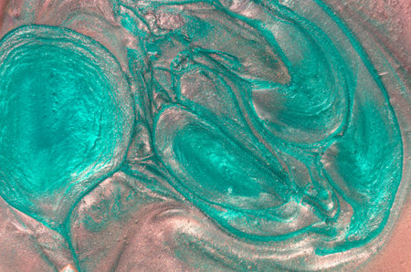 Abstract and exotic wavy structure. A glittering mass of glitter. A combination of pearl white and neon azure blue. Light reflections. Micro cosmos and the unity of sharp and circular lines.の写真素材