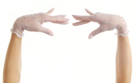 Close-up photo of two hands of dancer in white glovesの写真素材