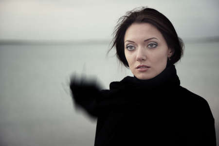 Sad woman outdoors movie-styledの写真素材