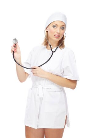 Sexy doctor in short dress holding stethoscopeの写真素材
