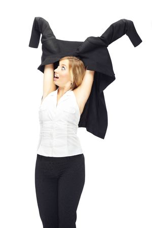 Happy lady putting on the business jacketの写真素材