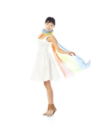 Elegant lady in the stylish dress and scarf dancing on a white backgroundの写真素材