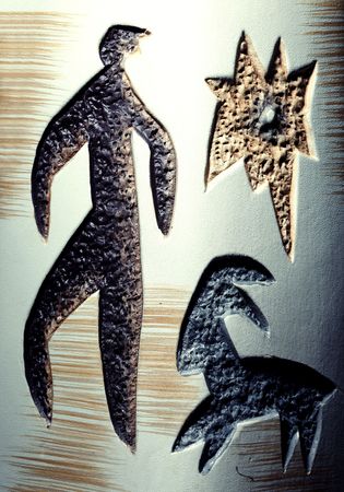 Ancient rock painting on the old stone. Natural light and colorsの写真素材