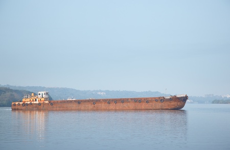 Old cargo vessel in the sea. Horizontal photoの写真素材