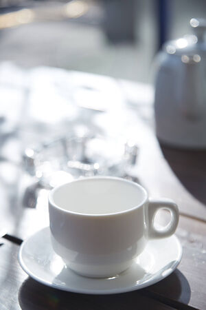Teacup on the table at outdoors cafeの写真素材