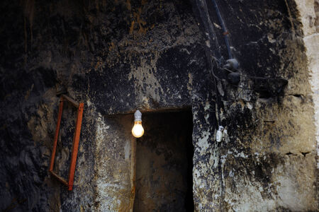 Lamp in abandoned house. Horizontal photoの写真素材