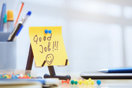 Good job text on adhesive note at officeの写真素材