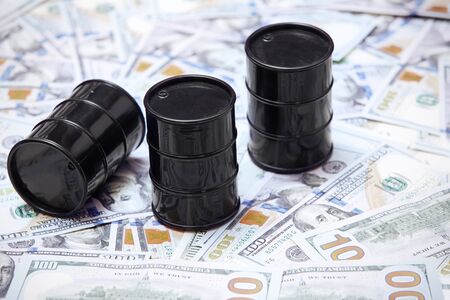 Oil drums on US dollars backgroundの写真素材