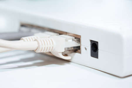 Network modem with cables. Close-up horizontal photo