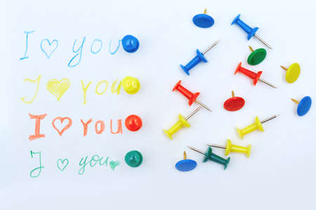 Love you letter with colorful push pins