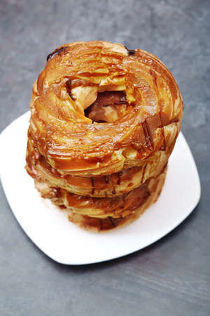 Glazed Doughnuts on a dessert plateの写真素材