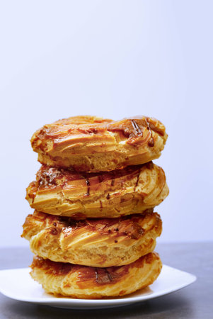 Glazed Doughnuts on a dessert plateの写真素材