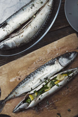 Fish stuffed by lemon and herbs with pepperの写真素材