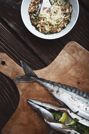 Fish stuffed by lemon and herbs with pepperの写真素材