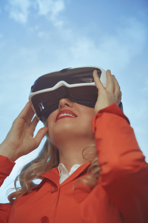 Woman wearing Virtual reality headsetの写真素材