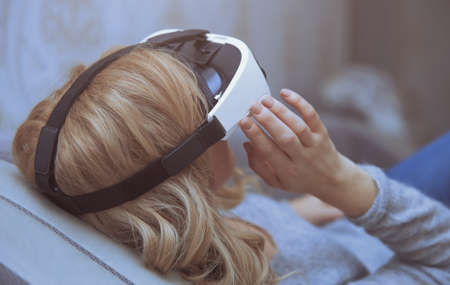Woman wearing Virtual reality headsetの写真素材