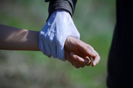 Hand of monster catching the womanの写真素材
