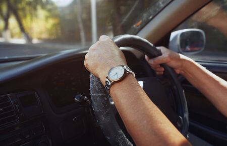 Senior 65-70 years man driving carの写真素材