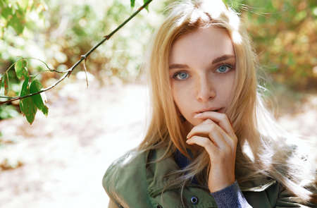 Young adult woman spending quality time in the forestの写真素材