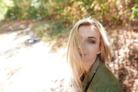 Young adult woman spending quality time in the forestの写真素材