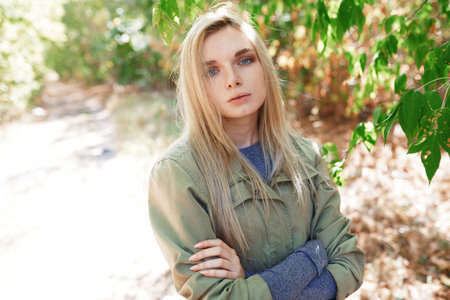 Young adult woman spending quality time in the forestの写真素材