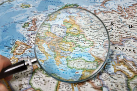 Ukraine under magnifying glass on mapの写真素材