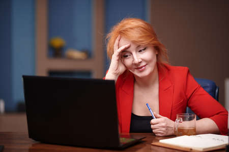 Businesswoman having video call at the officeの写真素材