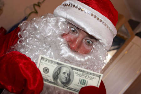 santa with moneyの写真素材
