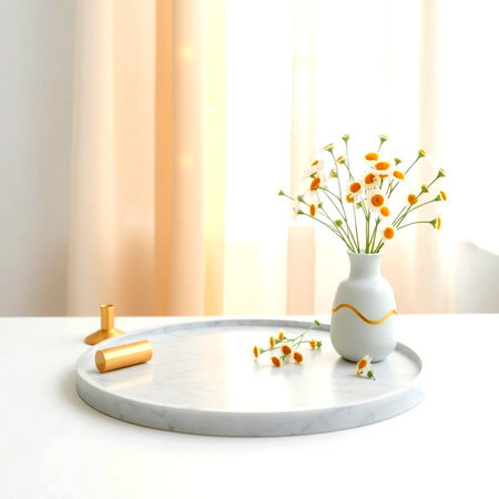 Vase with beautiful chamomile flowers on table in roomの写真素材