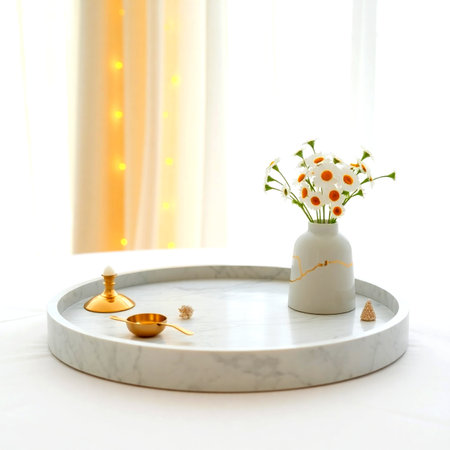 Ceramic vase with flowers on white marble table in roomの写真素材