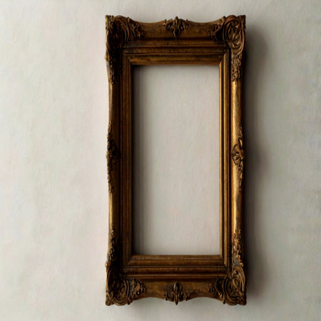 Old wooden picture frame on a white wall background. Copy space.の写真素材