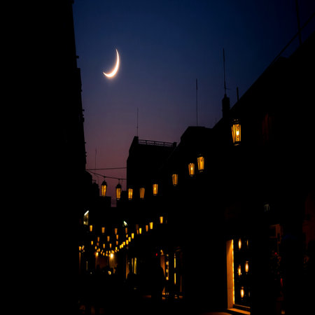 Night view of the old city with a crescent moon in the skyの写真素材