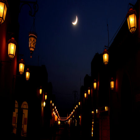 Night view of a street with lanterns and a crescent moonの写真素材