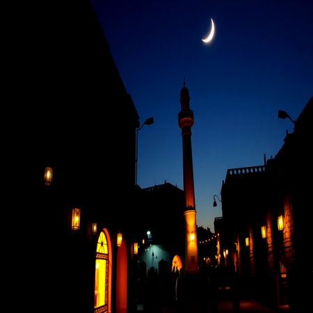Ramadan Kareem Mosque at night with a crescent moon.の写真素材